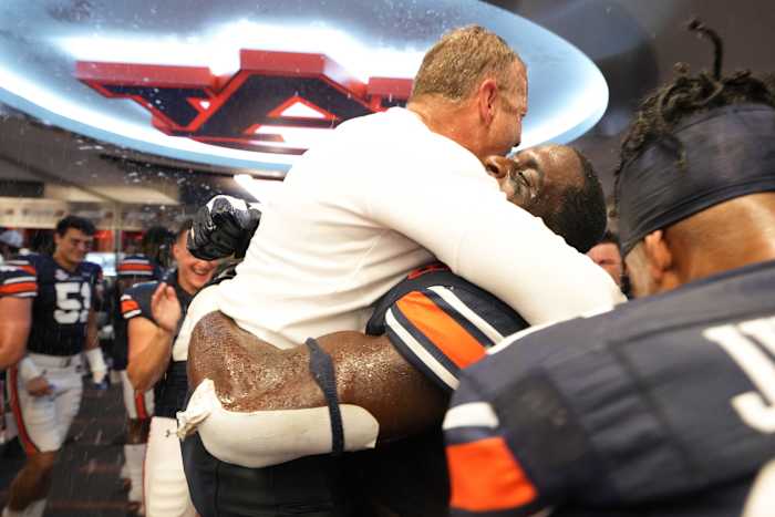 Auburn, AL, USA; Coach Bryan Harsin Locker Room Celebration during Auburn vs Missouri / Austin Perryman